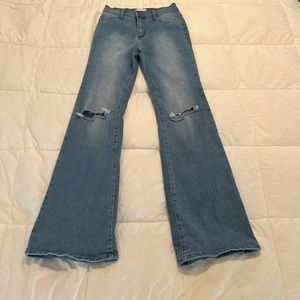 Boot cut jeans, loose fit.